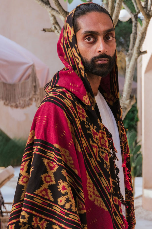 Mimpi Hooded Poncho Cape — Men's Red Gold, close detail of the hand-dyed Ikat weave