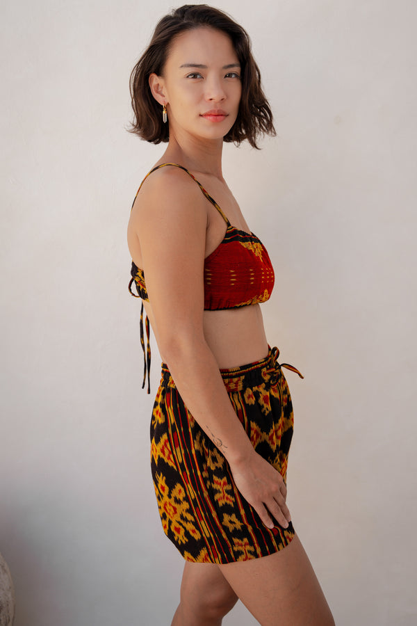 Sini Sana Two-Piece Set — Red Gold, close detail of the hand-dyed Ikat weave
