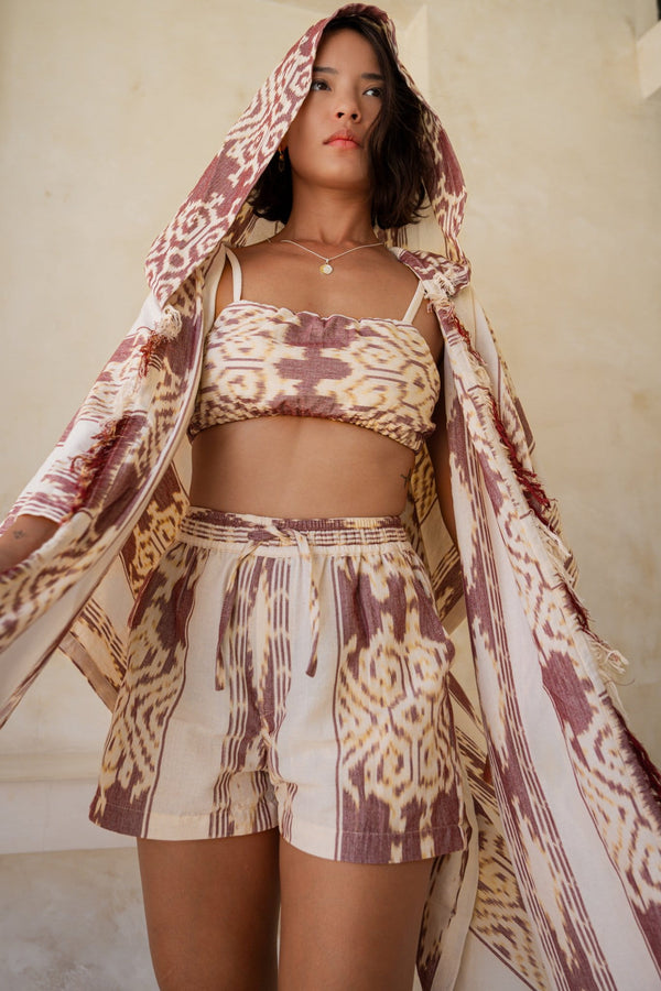 Mimpi Hooded Poncho Cape — Women's Burgundy White, handwoven Javanese Ikat, full-length styling