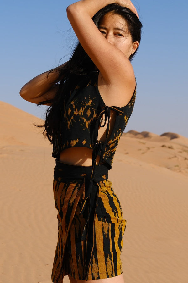 Hati Hati Two-Piece Set — Women's Black Gold, close detail of the hand-dyed Ikat weave