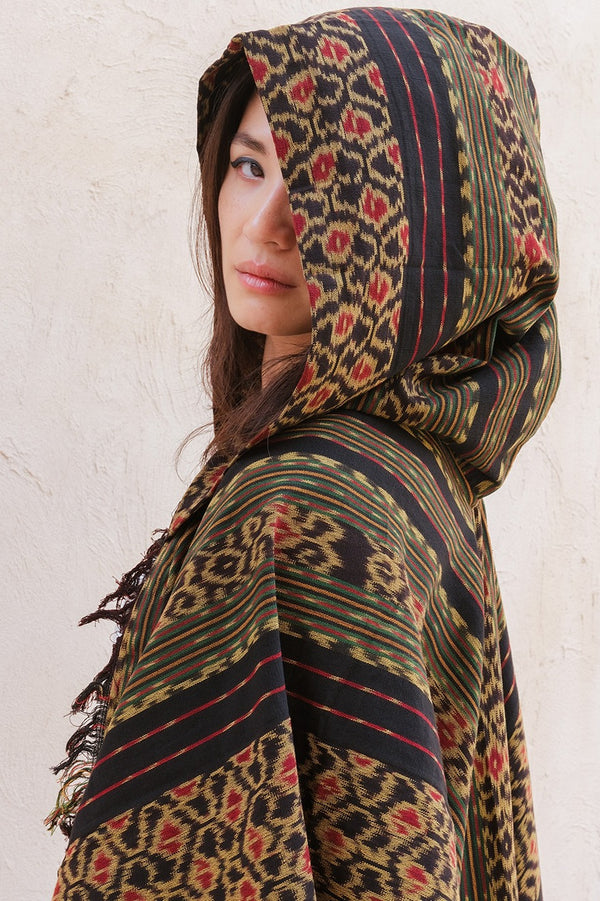 Mimpi Hooded Poncho Cape — Women's Jungle Gold, handwoven Javanese Ikat, full-length styling