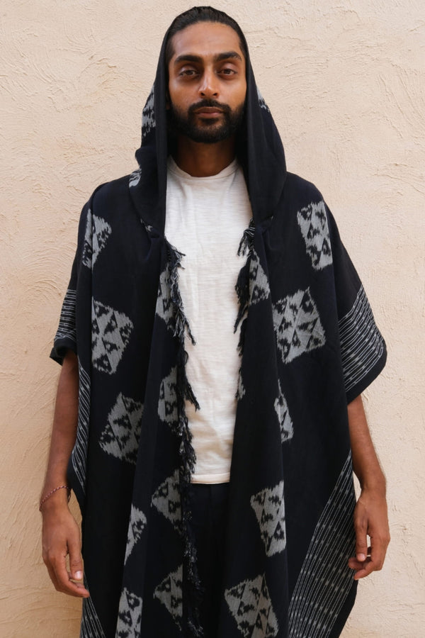 Mimpi Hooded Poncho Cape — Men's Black Diamond, handwoven Javanese Ikat, front view