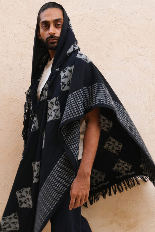 Mimpi Hooded Poncho Cape — Men's Black Diamond, close detail of the hand-dyed Ikat weave