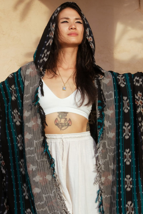 Mimpi Hooded Poncho Cape — Women's Grey Teal, handwoven Javanese Ikat, front view