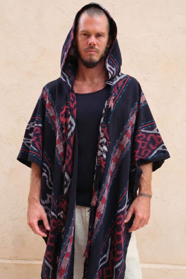Mimpi Hooded Poncho Cape — Men's Red Teal, handwoven Javanese Ikat, front view