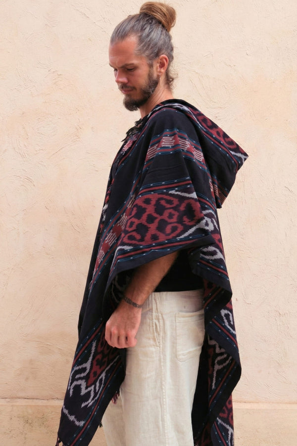 Mimpi Hooded Poncho Cape — Men's Red Teal, close detail of the hand-dyed Ikat weave