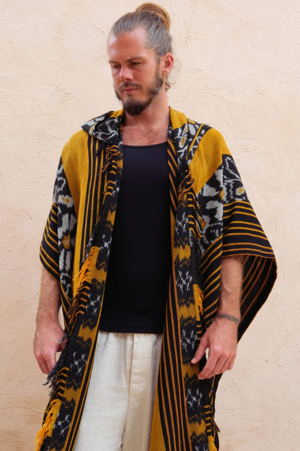 Mimpi Hooded Poncho Cape — Men's Yellow Flower, handwoven Javanese Ikat, front view