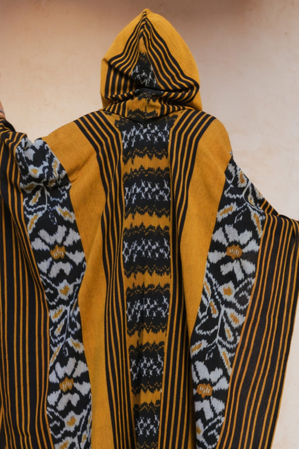 Mimpi Hooded Poncho Cape — Women's Yellow Flower, close detail of the hand-dyed Ikat weave
