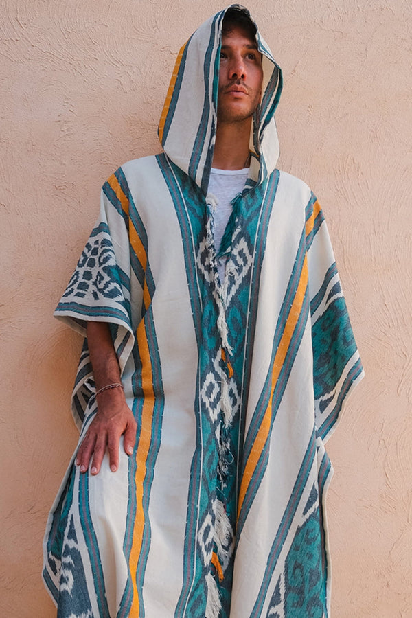 Mimpi Hooded Poncho Cape — Men's Teal Tribal, handwoven Javanese Ikat, front view