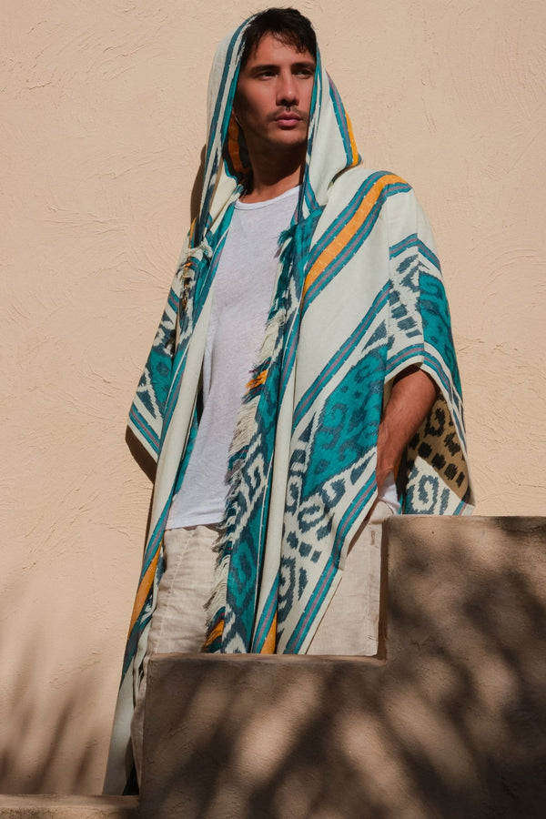 Mimpi Hooded Poncho Cape — Men's Teal Tribal, close detail of the hand-dyed Ikat weave